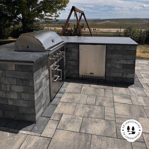 Completed outdoor kitchen with patio — Brighton CO — ER Landscaping